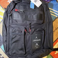 Brand New With Tags. Black Backpack With Pockets, Black Travel Bags For Back To School, Black On-the-go Standard Backpack, Black Backpack With Zipper For Streetwear, Black Backpack With Zipper Closure For Streetwear, Black Backpack With Zipper Pocket, Black Tote Backpack For Travel, Black Tote-style Backpack For Travel, Black Standard Backpack For Back To School