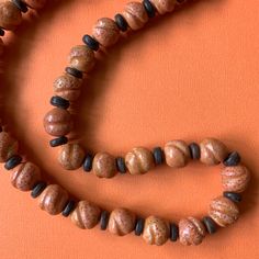 "Lovely vintage beaded coral necklace. measure approximately: 19 1/2\" long and 13mm coral beads condition: vintage X178" Artisan Red Coral Beaded Necklace With Polished Beads, Orange Red Coral Beaded Necklaces Hand-strung, Handmade Artisan Coral Beaded Necklaces, Artisan Coral Beaded Necklace Handmade, Artisan Hand-strung Red Coral Necklace, Artisan Handmade Coral Beaded Necklace, Artisan Red Coral Beaded Necklaces With Gemstone Beads, Handmade Coral Beaded Necklaces Spiritual Style, Handmade Coral Beaded Necklaces For Spiritual Use