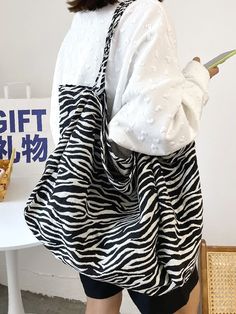 Bag For Love - Zebra Striped Tote Bag - Women Tote Bags Product Description Style Funky Color Black and White Quantity 1 piece Strap Type Double Handle Pattern Type Zebra Stripe Bag Size Large Magnetic No Type Shoulder Tote Bag Material Polyester Composition 70% Polyester Composition 30% Cotton Size Chart INCH CM Size Bag Width Bag Height Bag Length one-size 10.6 13.8 16.1 Size Bag Width Bag Height Bag Length one-size 27 35 41 Similar Products h2 { text-align: center; } .red-box { width: 100%; d Tote Bag Outfit, Striped Tote Bag, Striped Bags, Beachwear Fashion, Shoulder Tote Bag, Black & White, Black Tote Bag, Printed Tote Bags, Womens Tote