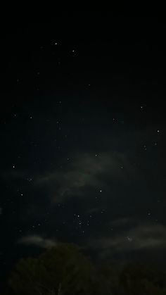 the night sky is full of stars and clouds