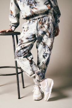 * current production lead time is 5-12 days Our signature sweats are a staple in any loungewear lineup. These comfy heavyweight fleece sweats boasting the label's signature tie-dye motif are an off-duty favorite. Cut from shrink-free cotton, they offer a relaxed fit that injects an extra dose of attitude into your laid-back look. Style your sweatpants with the matching sweatshirt for a high-impact head-to-toe look or pair back with a classic white tee. Individually hand-painted and dyed, every p Diy Tie Dye Techniques, Dye Pants, Tie Dye Sweatpants, Tie Dye Pants, Tie Dye Techniques, Tie Dye Diy, Matching Sweatshirts, Fleece Sweatpants, Spring Shirts