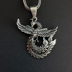 Phoenix Necklace, 925 Sterling Silver Greek Mythology Bird, Dragon Necklace, Anime Necklace, Phoenix Charm, Phoenix Rising, Gift for Him Phoenix Necklace 🔥 Introducing our Phoenix Necklace - a symbol of rebirth and resilience. This exquisite piece features a beautifully detailed phoenix, crafted from premium materials and finished with a radiant shine. Perfect for any occasion, the Phoenix Necklace adds a touch of elegance and mystique to your style. Wear it as a reminder of your strength and t Fantasy Style Oxidized Jewelry Gift, Fantasy Style Oxidized Jewelry As A Gift, Fantasy Oxidized Finish Jewelry As A Gift, Silver Round Pendant Necklace In Fantasy Style, Fantasy Silver Necklace With Round Pendant, Oxidized Silver Fantasy Jewelry, Fantasy Silver Round Pendant Necklace, Silver Oxidized Fantasy Jewelry, Bird Dragon