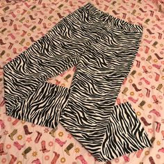 Super Cute Cropped Zebra Print Pants. Bought New And Washed But Never Worn. See Photos For Measurements. Marked L But Fits More Like A S. No Brand Tag. Casual Black Zebra Print Pants, Casual Fitted Bottoms With Zebra Print, Casual Stretch Zebra Print Bottoms, Casual Fitted Zebra Print Bottoms, White Stretch Bottoms With Zebra Print, White Zebra Print Stretch Bottoms, White Stretch Zebra Print Bottoms, Cropped Zebra, Zebra Print Pants