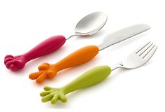 three spoons and two forks are in the shape of frog hands, one is pink, one is green