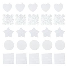 white paper cutouts with hearts, stars and circles in the shape of heart shapes