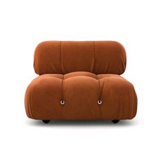 an orange chair with buttons on the armrests and foot rest, in front of a white background