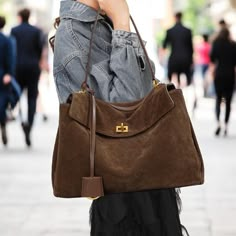 Discover our luxurious Suede Leather Tote Bag--the ultimate blend of style and practicality. Crafted from premium suede, this shoulder bag is soft to the touch, offering a timeless slouchy silhouette perfect for any occasion. 🌟 Available in beautiful shades of Caramel, Coffee, and Dark Brown, this bag comes in two versatile sizes to fit all your essentials: Small: 28 x 10 x 19 cm (11 x 3.9 x 7.5 in) Large: 35 x 11 x 23 cm (13.8 x 4.3 x 9.1 in) Looking for more? I have additional styles and colors available in high-quality suede and leather. Want extra photos or videos to make your choice easier? Just message me privately, and I'll be happy to share! 😊 Chocolate Suede Bag, Large Capacity Clutch Shoulder Bag For Daily Use, Versatile Bags With Gold-tone Hardware For Fall, Everyday Bags With Gold-tone Hardware For Fall, Fall Bags With Gold-tone Hardware, Suede Bags For Women, Luxury Fall Hobo Bag For Everyday, Versatile Large Capacity Clutch Shoulder Bag, Suede Purse Outfit