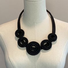 Modern Minimalist Artsy Unique Black Rubber Circular Necklace. New, No Tag. Made Of Rubber Stylish & Chic Versatile Accessory Modern Minimalist Styling Adjustable Clasp Closure Chic Adjustable Black Necklaces, Chic Adjustable Black Necklace, Chic Black Adjustable Necklace, Black Minimalist Jewelry For Everyday, Black Rubber, Minimalist Fashion, Modern Minimalist, Womens Jewelry Necklace, Jewelry Necklaces