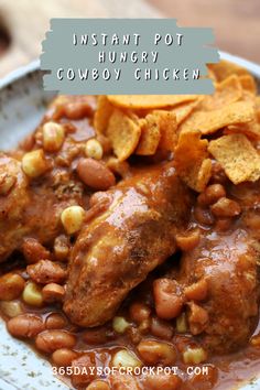 a white plate topped with chicken covered in beans and corn