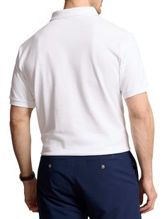 An American style standard since 1972, the Polo shirt has been imitated but never matched. Over the decades, Ralph Lauren has reimagined his signature style in a wide array of colors and fits, yet all retain the quality and attention to detail of the iconic original. This version is made of highly breathable cotton mesh, which offers a textured look and a soft feel, and is finished with the beloved Polo Bear.​​100% cotton Ribbed-knit collar2-button placketPolo Bear and "Polo" embroidered at the Classic White Polo Collar Shirt, White Classic Camp Shirt With Relaxed Fit, Classic White Camp Shirt With Relaxed Fit, Classic White Relaxed Fit Camp Shirt, Unstructured Collared White Top, Unstructured White Collared Top, Classic Camp Shirt With Johnny Collar, Classic Top With Johnny Collar And Unstructured Fit, White Fitted Polo Shirt With Spread Collar