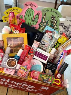 a wooden box filled with lots of different types of cosmetics and beauty products on top of a table