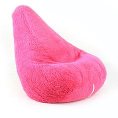 a pink bean bag chair sitting on top of a white floor