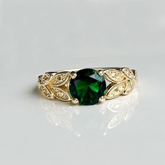 Don't miss this opportunity to own this beautiful gemstone ring! => Gemstone Type - Lab Grown Emerald => Gemstone Size - 7 mm => Gemstone Cut - Faceted => Gemstone Shape - Round => Metal Type - 14k Gold Filled (Tarnish Resistant and Nickel Free) - also available in 925 sterling silver and 14k solid gold * Please contact me for pricing on sizes smaller than 4 or larger than 11 * ~ Feel free to ask me about custom made designs. ❏ Replacements and custom orders: ✪ 925 sterling silver - no additiona Elegant Green Topaz Promise Ring, Green Cubic Zirconia Round Band Jewelry, Green Diamond Ring With Center Stone, Heirloom Green Ring For May Birthstone, Elegant Flower Ring As Promise Ring With May Birthstone, Elegant Green Topaz Ring, Round Cut, Elegant Green Topaz Round Cut Ring, Elegant Green Topaz Ring With Round Cut, Elegant Green Round Cut Topaz Ring