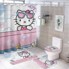 a bathroom with hello kitty shower curtain and rugs