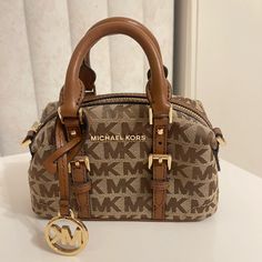 Never Used Small Michael Kors Small Charm Bag. Comes With Brown Crossbody Strap. Brown Michael Kors Bag, Michael Kors Bag Brown, Michael Cole, Tiny Bag, Ribs Recipe, Goyard Bag, Brown Crossbody, Willy Wonka, Small Charms