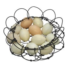 a wire basket filled with eggs on top of a white background, surrounded by black wires