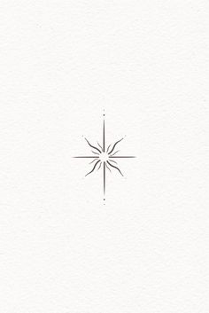 a white paper with a black and white drawing of a snowflake on it