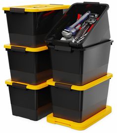 three plastic storage containers with tools in them on top of each other, one yellow and the other black