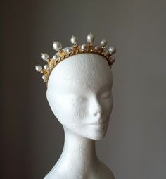 This crown is made to order and ready to ship by 3-4 week Large pearl crown, Gold bridal tiara, Wedding pearl crown ~MATERIALS~ -Czech glass white clear crystals -Japanese cotton pearls -Gold filigree ~SIZE~ Size of pearls - 12, 14 18 mm, height 1 1/2 inches ~SHIPPING AND DELIVERY TIME~ This headpiece is ready to ship by 3-4 week The approximate time of shipment: - 10-16 days to Europe - 15-35 days to United States and other countries. ~IMPORTANT INFORMATION~ -Please allow as much time for shipp Bridal Pearl Headband, Pearl Tiara Wedding, Tiara Gold, Pearl Crown, Pearl Bridal Headband, Pearl Tiara, Gold Tiara, Crown Bridal, Crown Wedding