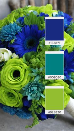 blue and green flowers are arranged in the same color scheme for this bouquet, which is accented with greenery