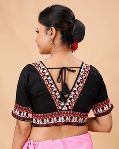 a ready-made, pure cotton, embroidered design blouse. These types of blouses are popular for their comfort and aesthetic appeal, especially in traditional and ethnic wear.  Blouse available in 32,34 waist size waist-32 =36 Bust waist-34=38 Bust Traditional V-neck Blouse With Floral Embroidery, Traditional V-neck Choli With Resham Embroidery, Bollywood Style Embroidered V-neck Top, V-neck Traditional Wear With Chikankari Embroidery, Diwali Embroidered Blouse, Black Tops With Resham Embroidery For Festivals, Traditional V-neck Top With Chikankari Embroidery, Festive Cotton V-neck Top, Traditional Black Blouse With Resham Embroidery