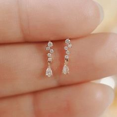 ✰ We send these pear cut diamond earrings with 100% safe Alpa system clips. Secure clips for bad events such as falling, getting lost. These clips are also 14K and 18K gold. We have thought of everything for you. You just choose what's best for you! Drop Diamond Gold Dangle Earrings PAIR EARRINGS ✰ Total Diamonds: 0.36 Carat ✰ Pear Diamonds: 0.24 Carat ✰ Round Diamonds: 0.12 Carat ✰ Diamonds Clarity: SI F ✰ Pear Diamond Size: Length 4.2 mm. Width 2.8 mm. ✰ 14K Solid Gold ✰ Rose Gold | White Gold Top Earrings, Teardrop Diamond Earrings, Earrings Women, Small Elegant Earrings, Diamond Dangling Earrings, Diamond White Dangle Teardrop Earrings, Teardrop Diamond Crystal Earrings With Prong Setting, Delicate Earrings Diamonds, Earrings Drop