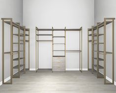 an empty room with several shelves and shelving units