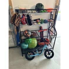 there is a rack with many items on it in the garage, including a bike and helmet