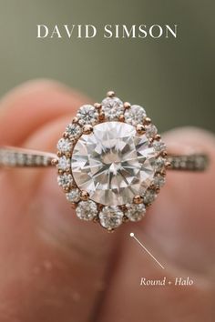 a round halo engagement ring with diamonds in the center and an inscription that reads round halo ring