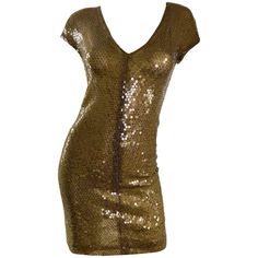 Sexy vintage early 1990s KRIZIA hunter green silk sequined semi sheer mini dress! Features thousands of hand-sewn deep green sequins on double layered silk net. Simply slips over the head, and stretches to fit. Can easily be dressed up or down, and perfect all year round. Great belted or alone, and with wedges, sandals or flats for day, and heels or boots for day. Would also look fantastic with a blazer or denim jacket! In great unworn condition. Made in Italy Approximately Size Medium (tons of Vintage Green Dress, Forest Green Dresses, Short Green Dress, Green Cocktail Dress, Sheer Mini Dress, Cocktail Dress Vintage, Sequin Cocktail Dress, Dresses Cocktail, Mini Robes