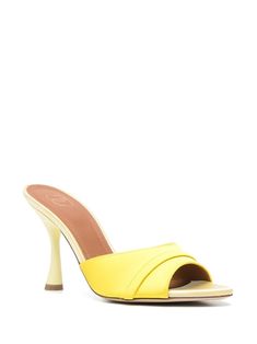 95mm sculpted heeled mules from Malone Souliers featuring banana yellow, calf leather, satin trim, pointed toe, open toe, crossover strap detail, branded leather insole and high sculpted heel. This item is in size 37 and the color is Yellow