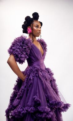 A masterpiece of ethereal elegance, the Dream Weaver dress is a vision in rich purple tulle. Its intricate layers of ruffles flow gracefully from the bodice, creating a mesmerizing effect that evokes a sense of enchantment. Crafted from high-quality tulle, this dress offers a soft and luxurious feel against the skin. The deep V-neckline adds a touch of sensuality and charm. The puffed sleeves provide a playful and feminine touch. It has a back zipper closure. The gown is designed to flatter the figure with a comfortable and flattering fit. CARE INSTRUCTIONS 𐙚 Hand wash cold 𐙚 Air dry on a hanger 𐙚 Avoid bleach and harsh detergents 𐙚 Steam on low heat, if necessary Purple Ruffled Dress For Gala, Purple Ruffle Dress For Gala, Purple Ruffled Evening Dress, Purple Ruffled Gown For Formal Occasions, Purple Ruffled Floor-length Dress, Purple Floor-length Dress With Ruffles, Purple Floor-length Ruffled Dress, Purple Floor-length Ruffled Evening Dress, Purple Floor-length Evening Dress With Ruffles