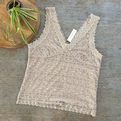 Adiva Beige Spandex Lace V Neck Tank Top New With Tags. Excellent Condition. Please See Photos. Measurements Across From Garment Laying Flat: Pit To Pit: 19” Length: 25” Size Large. V Neck Tank Top, Tank Top, Spandex, V Neck, Tank Tops, Wardrobe, Tags, Lace, Women Shopping