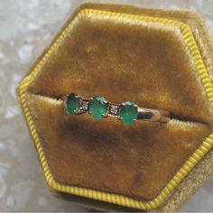 Three Oval Emeralds Set In 9k Yellow Gold (Hallmarked) With Diamond Accents. Size 9.5 - Can Be Resized By Any Jeweler Ring Weighs 2 Grams Ring Face 13mm X 4mm Excellent Vintage Condition Gold Box Sold Separate Modern / Mid Century / Victorian Mid Century Victorian, Gold Vintage Ring, Estate Rings, Gold Box, Vintage Ring, Oval Diamond, Womens Jewelry Rings, Solitaire Ring, Green And Gold