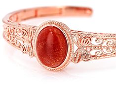 Timna Jewelry Collection™ 16x12mm Oval Sunstone Copper Cuff Bracelet. Measures Approximately 7.5"L x 0.79"W. Hinged Closure. Includes Polish Cloth. Copper Cuff Bracelet, Copper Cuff, Cuff Bracelet, Jewelry Collection, Copper, Cuff, Bracelet