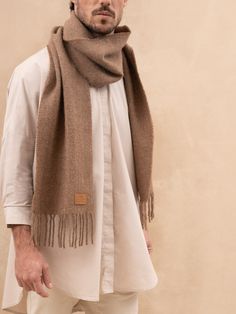 Our 100% natural fibre scarf is a must-have accessory for any fashion-forward individual. Made from the finest llama and sheep wool, this scarf combines the best in comfort, texture and style. The scarf is available in 16 stunning colors that complement outfits all year round, whether the weather’s cooling, or you’re in the middle of winter - our 100% natural fibre scarf is the perfect accessory. The fringe detailing adds a touch of sophistication to the look, making it the perfect accessory for Scarf Outfit, Mens Beanie, Natural Fibre, Fleetwood Mac, Sheep Wool, Natural Fibers, Winter Scarf, Llama, Winter Coat