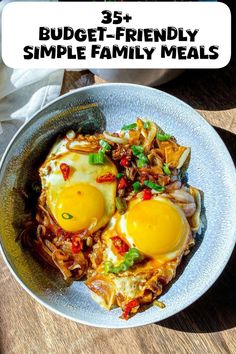 a white plate topped with eggs and noodles