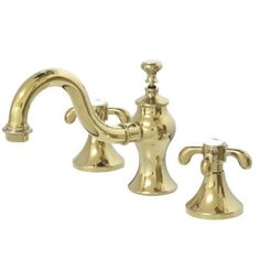 two handle bathroom faucet in polished brass finish with matching handles and side spray