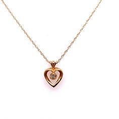 Vintage 14k yellow gold small heart with diamond pendant necklace. The single cut diamond weighs about .05ct with H color and I1 clarity. The heart pendant measures 11.1mm wide and 15.6mm long including the bail. The 14k yellow gold rope link chain is 16 inches long. Solitaire Pendant Necklace, Plain Bands, Gold Engraving, Solitaire Pendant, Small Heart, Diamond Solitaire Engagement Ring, Diamond Pendant Necklace, Diamond Pendant, Heart Charm