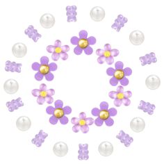 an image of flowers and pearls in the shape of a circle