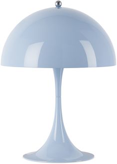 a light blue table lamp on a white background