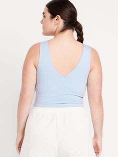 v-neck wide straps go-dry wicks moisture breathable fitted hits at natural waist provides light support for a-c cups models are approx.  5'9" and wear sizes s (4), l (12), and xl (18)machine wash according to the care instruction label Solid V-neck Activewear For Spring, Casual Activewear With Built-in Bra For Relaxation, Athleisure V-neck Crop Top With Built-in Bra, Seamless Stretch V-neck Activewear, Spring V-neck Activewear For Yoga, Blue Sleeveless Activewear With Seamless Construction, Casual Activewear With Built-in Bra And Wide Straps, Blue V-neck Tank Top With Built-in Bra, Compressive Seamless V-neck Sports Bra