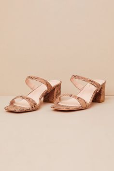 You'll always be ready to step out with a praise-worthy OOTD when you have the Lulus Zurie Natural Snake-Embossed High Heel Slide Sandals! Chic, snake-embossed faux leather shapes these must-have sandals with a square footbed, a curved slender toe strap, and a matching vamp strap. The effortless slide-on design sits atop a sturdy block heel. 2. 25" wrapped block heel. Cushioned insole. Rubber sole has nonskid markings. Man made materials. Imported. Lulus | Zurie Natural Snake-Embossed High Heel Tan Shoes, Shoe Print, Spring Shoes, Emboss, Slide Sandals, Block Heels, Shoes Sandals, Sandals Heels, Shoes Heels