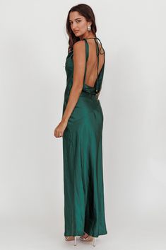 Satin maxi dress Backless Invisible side zipper Cowl neckline You'll look like you just stepped straight off the red carpet in our gorgeous Cassiopeia dress. Featuring a cowl neckline and an open, draped back. It's perfect for a wedding or special birthday celebration. Team it with diamante heels and a clutch for a show stopping look. MODEL INFO Model is wearing size XS Height: 5'8" Bust: 31.0" Waist: 24.0" Hips: 35.0" CARE Hand Wash Cold. Do Not Iron. MATERIAL POLYESTER Chic Maxi Dress With Cowl Back For Party, Cowl Back Maxi Dress For Date Night, Date Night Maxi Dress With Cowl Back, Green Cowl Back Party Dress, Green Cowl Back Dress For Party, Prom Season Maxi Evening Dress With Tie Back, Sleek Tie-back Maxi Dress For Party, Prom Season Evening Dress With Tie Back, Green Ruched Back Evening Dress