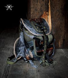 A backpack in a rugged, distressed style featuring post-apocalyptic elements. Made from khaki and gray genuine leather. Shaded using an airbrush and hand techniques. It has four exterior pockets and one interior pocket. An original design, one-of-a-kind piece. Dimensions: 34cm x 27cm x 10cm. Backpack Designs, Inktober Art, Handmade Leather Backpack, Leather Backpacks, Personal Style Inspiration, Vintage Backpacks, Gray Leather, Post Apocalyptic, Backpack Purse