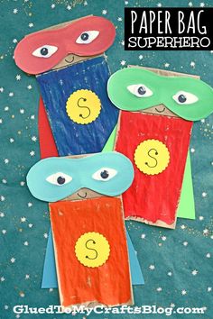 three paper bag superheros with the letter s on them and stars in the background