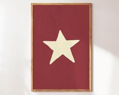 a red wall with a white star on it