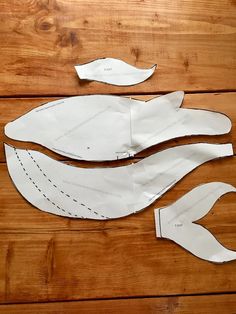 the paper fish is cut out and ready to be sewn