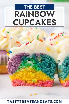 the best rainbow cupcakes with white frosting and sprinkles on top