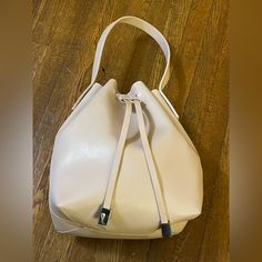 Nwot Forever 21 Cream Bucket Bag With Dual Straps - Small. Pu Leather Bucket Bag With Drawstring Closure. Comes With An Adjustable And Detachable Shoulder Strap And Attached Short Strap. Easy To Change The Bucket Purse Into A Crossbody Bag, Single Shoulder Bag Or A Top Handle Handbag. Silver-Tone Hardware. Brand New Bag. Never Used. Kept In Storage. Excellent Condition. Pet Friendly And Smoke Free Home. Bundle For Best Deal. All Sales Are Final. No Returns Or Exchanges. Trendy Forever 21 Shoulder Bag With Adjustable Strap, Chic Forever 21 Bag For Daily Use, Forever 21 Shoulder Bag With Adjustable Strap, Forever 21 Bags With Adjustable Strap For Everyday, Forever 21 Everyday Bags With Adjustable Strap, Forever 21 Bags For Everyday Use, Trendy Forever 21 Bag With Adjustable Strap, Forever 21 Shoulder Bag For Everyday Use, Trendy Forever 21 Shoulder Bag For Daily Use